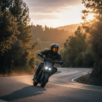 A rider wearing a helmet and protective gear on a Nami Burn E2 electric scooter on a scenic road, emphasizing safety